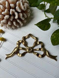 Brass Bow Pediment
