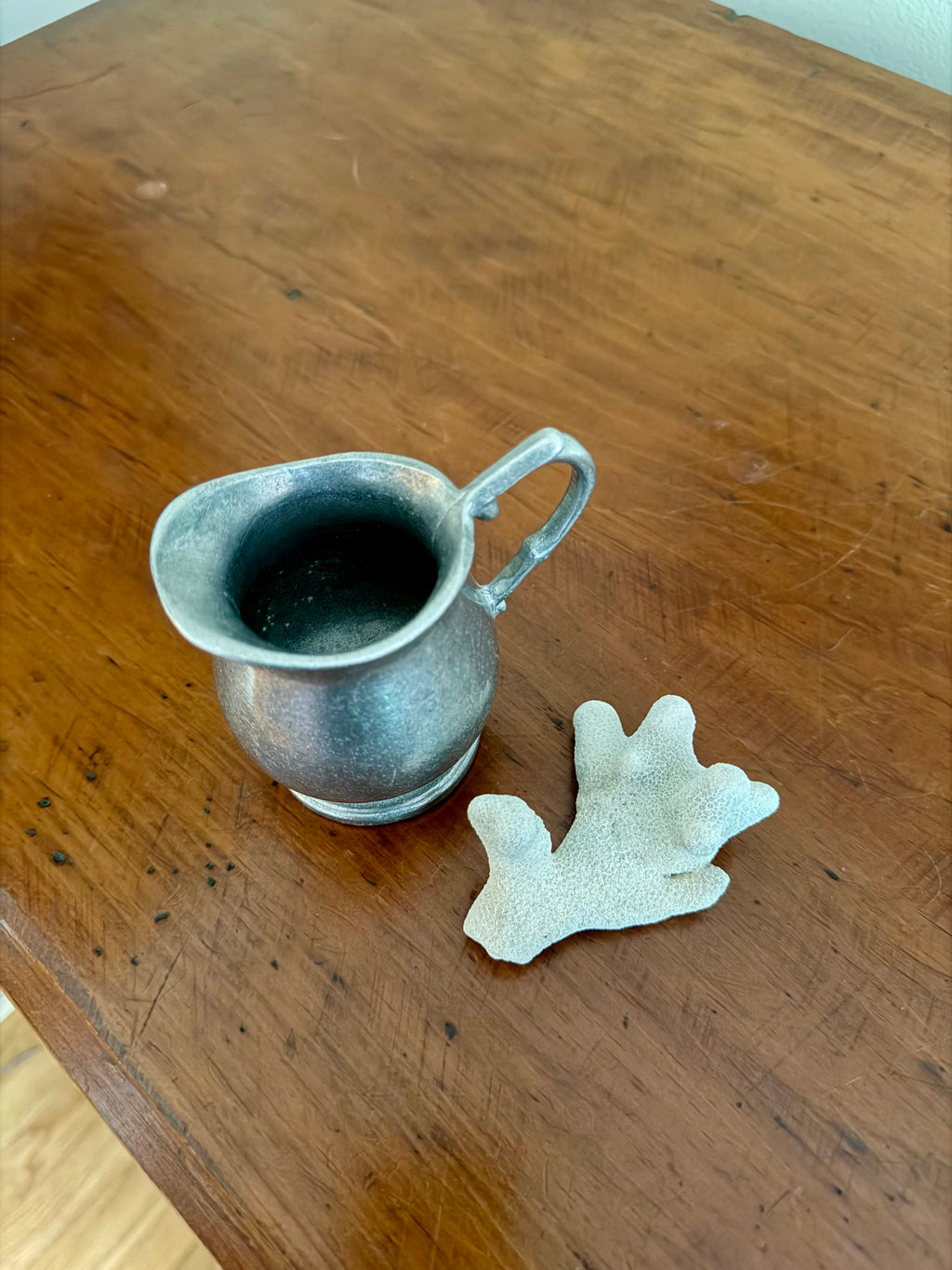 Pewter Vessel and Coral